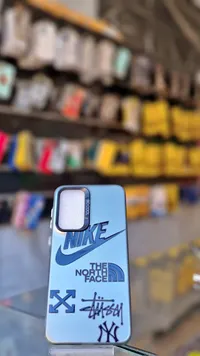 كفر جوال بتصاميم رياضية - نايكي وذا نورث فيس (Nike)