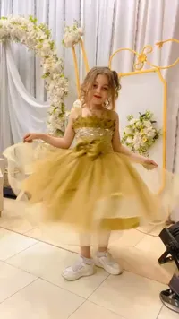 فستان سهرة منفوش للأطفال باللون الذهبي