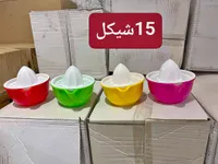 عصارة حمضيات يدوية بلاستيكية - سوق غزة