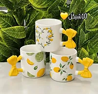 مجات بأشكال حبات الليمون مع مقبض الفيونكة
