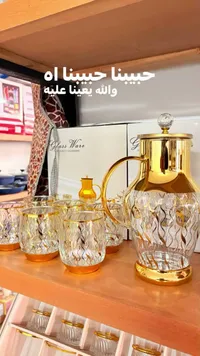 طقم دلة وكاسات زجاجية ذهبية