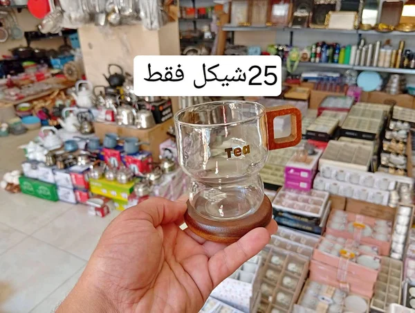 كوب شاي زجاجي بقاعدة خشبية - أدوات منزلية - سوق غزة