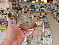 كوب شاي مع صحن خشبي (Tea)