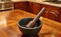 هاون ومدقة من الجرانيت الأسود