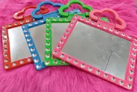 مرآة يدوية مزينة بالكريستال