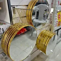 مرآة ديكور دائرية بإطار ذهبي