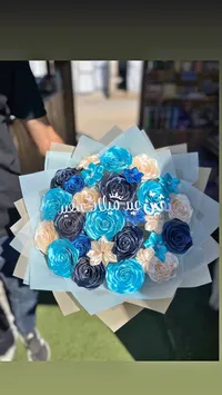 باقة زهور صناعية يدوية بتصميم عيد ميلاد سعيد