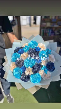 باقة زهور صناعية يدوية بتصميم عيد ميلاد