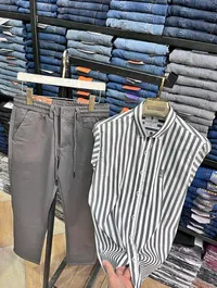 طقم ملابس رجالي - قميص بولو وبنطال سليم فيت (U.S. Polo Assn.)