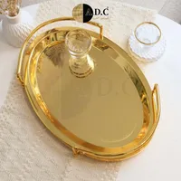 صينية تقديم ذهبية - A.D.C