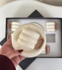 طقم أوعية سيراميك بمقابض خشبية