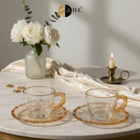 أكواب وصحون شاي - A.D.C