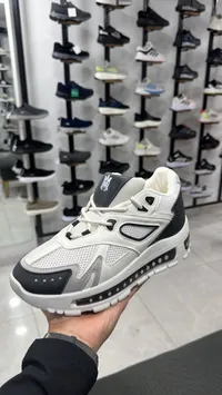 حذاء رياضي شبابي أبيض وأسود