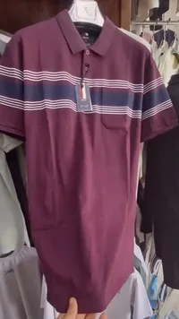 قميص بولو رجالي مخطط - تومي هيلفيغر (Tommy Hilfiger)