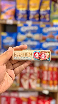 شوكولاتة بالحليب مع جوز الهند واللوز - روشين (Roshen)