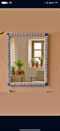مرآة حائط بإطار مزخرف بنمط بحري