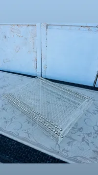 سلة تخزين شفافة بمقابض معدنية