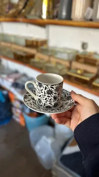 فنجان قهوة بتصميم زهوري - طقم فنجان وصحن