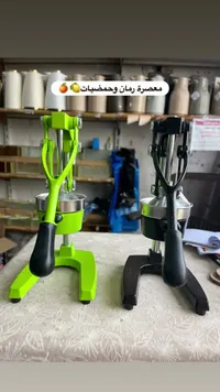معصرة رمان وحمضيات يدوية
