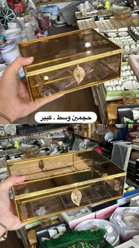 صندوق تنظيم زجاجي بإطار ذهبي مع تعليقة ورقة شجر