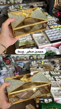 صندوق زجاجي مزخرف بتصميم الفراشة