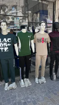تشكيلة ملابس رياضية رجالية متنوعة (Adidas, Lacoste, Diesel)