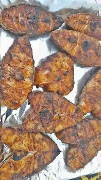 شرائح سمك مقلي متبلة