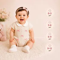 رومبر مواليد محبوك بياقة بيضاء وفيونكات وردية