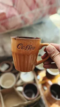مج سيراميك للقهوة بلون بني
