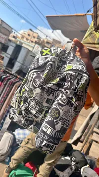 حقيبة ظهر بطبعة جرافيتي (Vans)