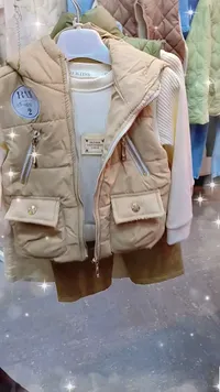 جاكيت بوفيه للأطفال بيج اللون