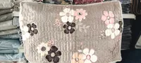 غطاء وسادة مزخرف بنقوش الزهور