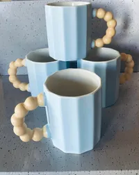 كوب شاي فاخر — تصميم عود لؤلؤي