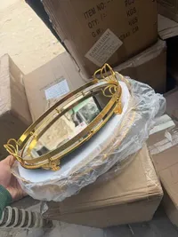 صينية تقديم ذهبية بمقابض زخرفية