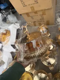إبريق شاي كريستالي بغطاء ذهبي