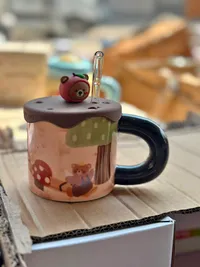 كوب مع غطاء وماصة بتصميم دب