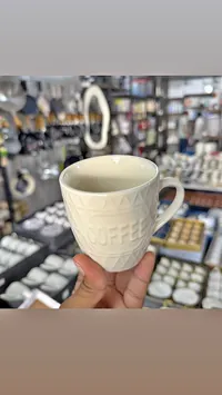 كوب قهوة بنقوش بارزة