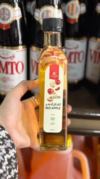 شراب مركز بنكهة التفاح الأحمر - الشيخ قاسم