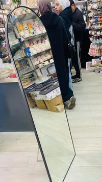 مرآة أرضية بإطار معدني