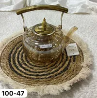 براد زجاج بمقبض معدني ذهبي