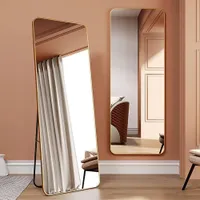مرآة أرضية بإطار ذهبي