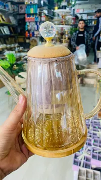 إبريق زجاجي بغطاء خشبي وكرة كريستال