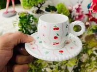 فنجان قهوة سيراميك برسومات الكرز