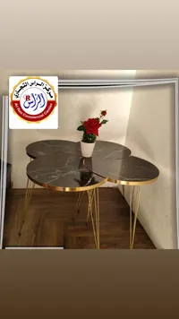 طاولة قهوة رخام أسود - تصميم أوراق ذهبي