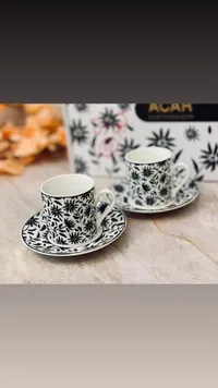 طقم فناجين قهوة بتصميم زهور سوداء