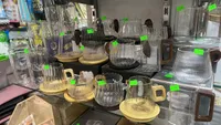 كاسة زجاجي مع غطاء خشبي