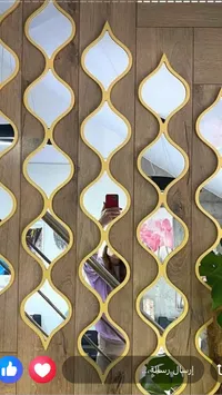 مرايا حائط ديكورية بتصميم هندسي ذهبي