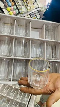 طقم كاسات عصير زجاجية بحواف ذهبية