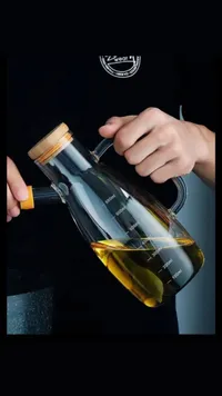 وعاء زجاجي لتوزيع الزيت مع مقياس