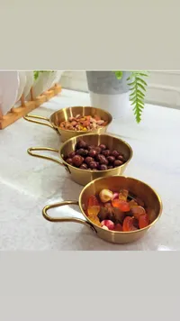 طقم صحون تقديم ذهبية بمقبض